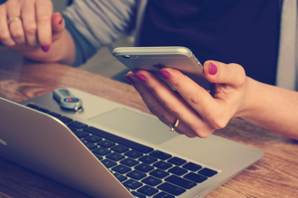 Attendee using summit app on smartphone to manage meetings and connections